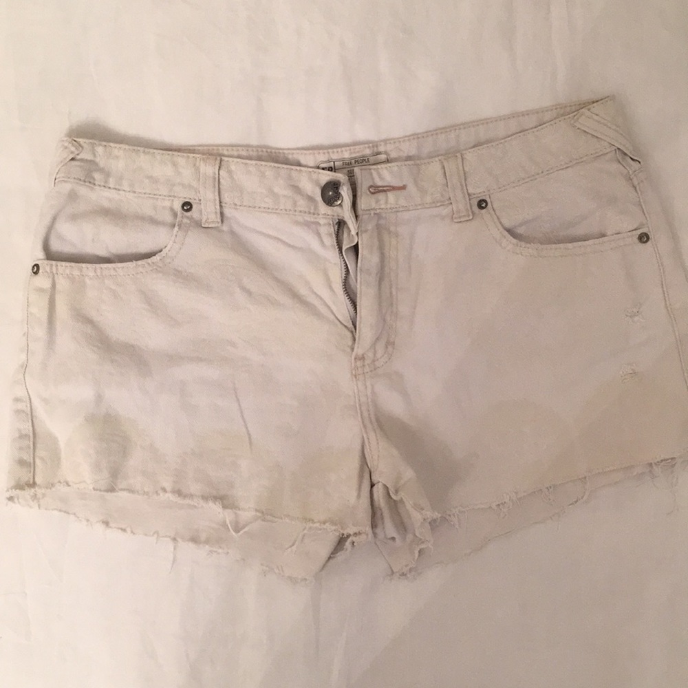 Free Prople White detailed jean shorts.